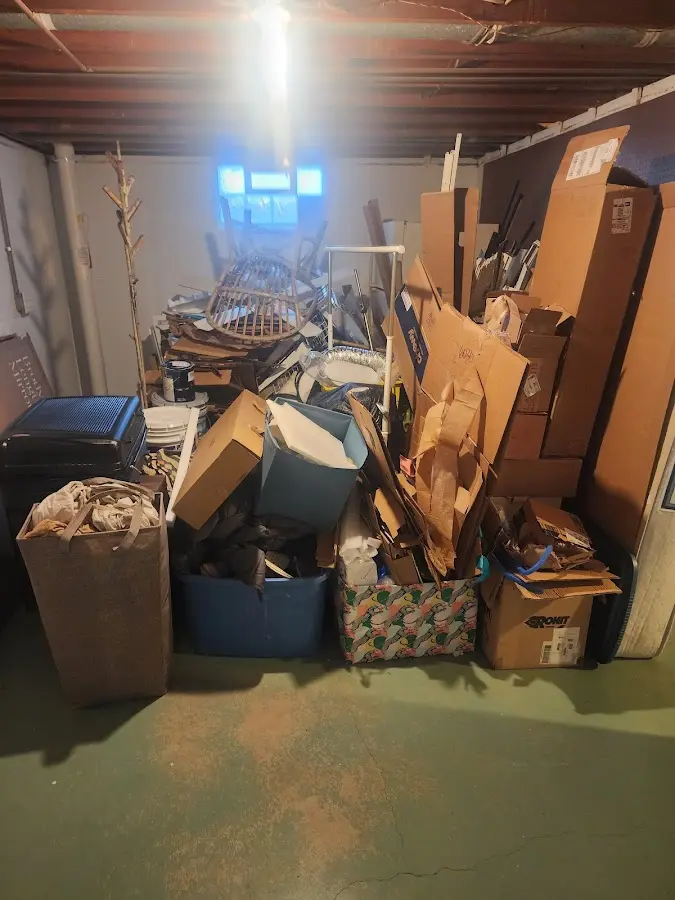 Roll-off dumpster container at job site for Roll Off Dumpster Rental in Lee